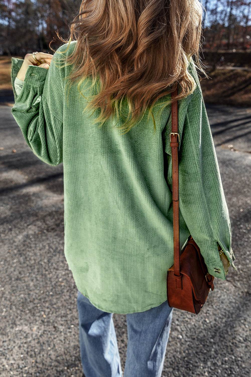 Mist Green Patched Pocket Button Up Corduroy Shacket with brown crossbody bag outdoors.