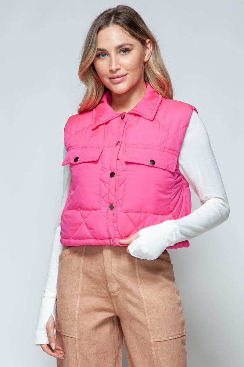 Snobbish Snap Down Quilted Crop VestThe snap-down quilted crop vest is a stylish and versatile addition to your wardrobe. With its snap-button closure and cropped length, this vest offers a modern and OuterwareTrendsiKlondike Creek Unique BoutiqueQuilted Crop Vest