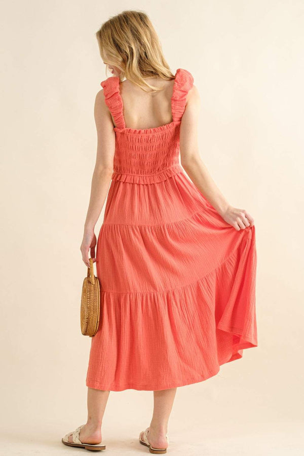 Smocked Ruffled Tiered Dress in coral with a smocked bodice and ruffled tiers.