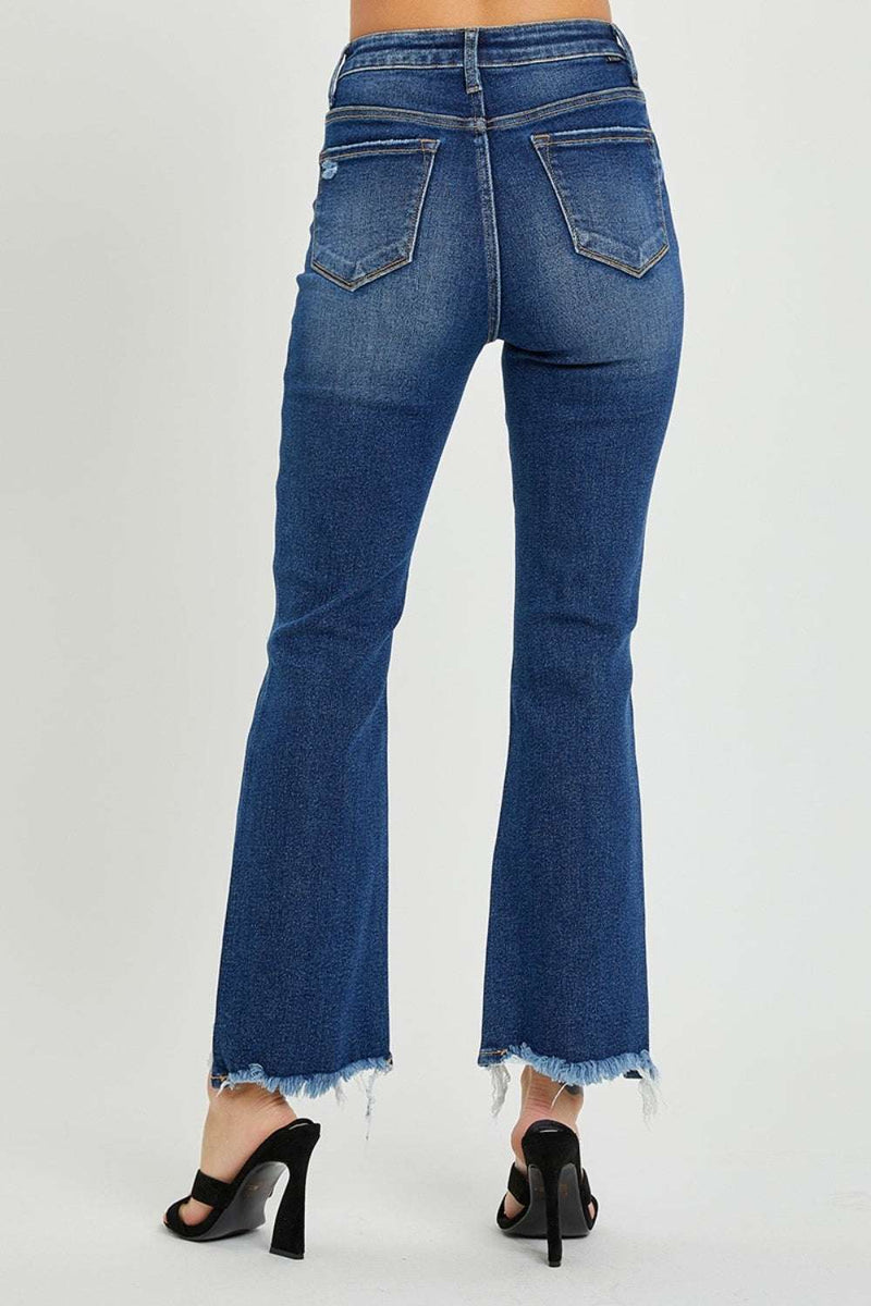RISEN High Rise Distressed Crop Flare JeansAdd a touch of vintage-inspired style to your wardrobe with our Risen High Rise Distressed Crop Flare Jeans. These jeans feature a flattering high rise fit that hugsBottomsTrendsiKlondike Creek Unique BoutiqueRISEN High Rise Distressed Crop Flare Jeans