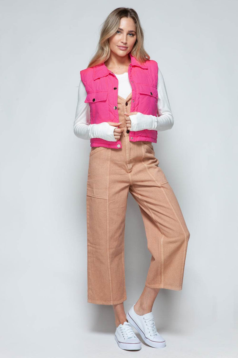 Snobbish Snap Down Quilted Crop VestThe snap-down quilted crop vest is a stylish and versatile addition to your wardrobe. With its snap-button closure and cropped length, this vest offers a modern and OuterwareTrendsiKlondike Creek Unique BoutiqueQuilted Crop Vest