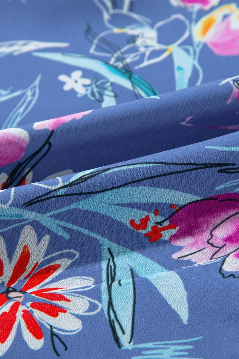 Frill Printed Grecian Tank with floral design on blue fabric.