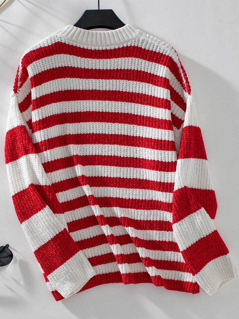 Striped round neck long sleeve sweater in red and white.