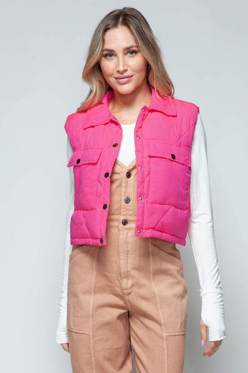 Snobbish Snap Down Quilted Crop VestThe snap-down quilted crop vest is a stylish and versatile addition to your wardrobe. With its snap-button closure and cropped length, this vest offers a modern and OuterwareTrendsiKlondike Creek Unique BoutiqueQuilted Crop Vest