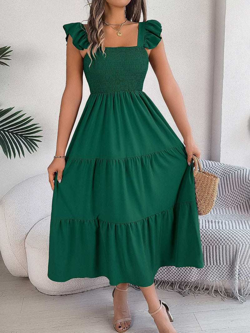Smocked square neck cap sleeve midi dress in green, featuring a tiered skirt design.