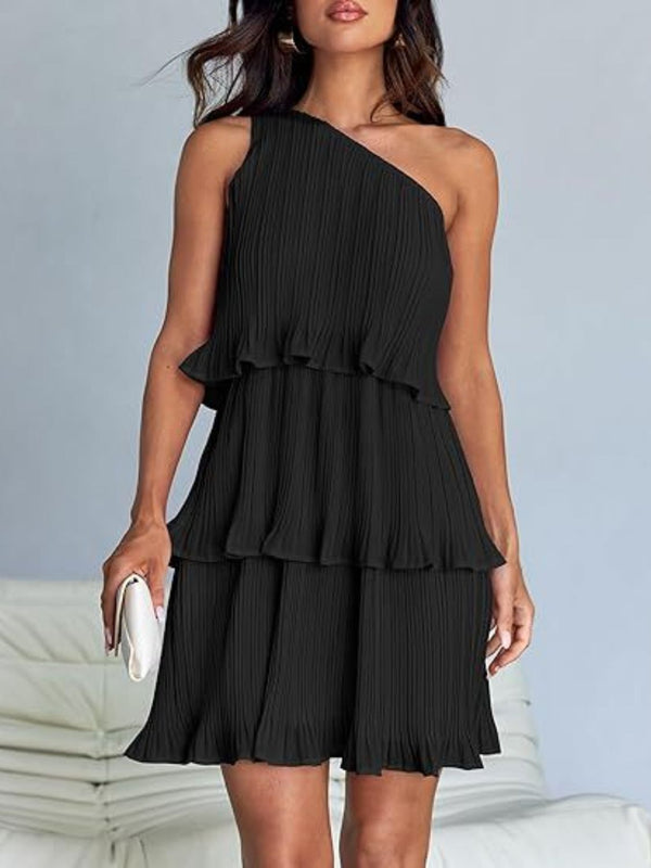 Layered single shoulder mini dress with ruffled tiers in black.