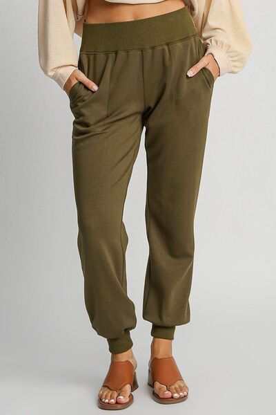 Umgee full size high rise knit joggers with pockets in olive green.