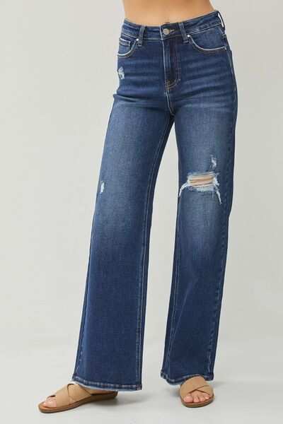 RISEN Full Size High Rise Distressed Wide Leg Jeans with pockets and slightly stretchy fabric.