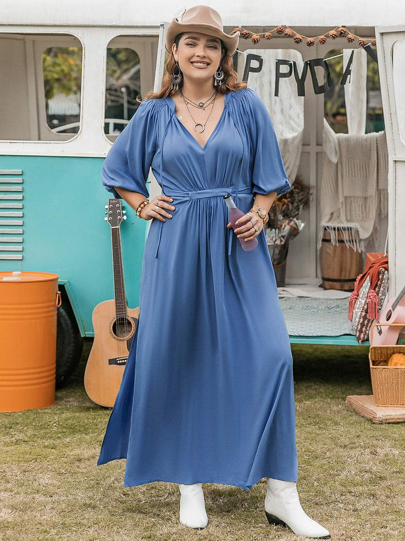 Plus size blue ruched slit three-quarter sleeve midi dress.