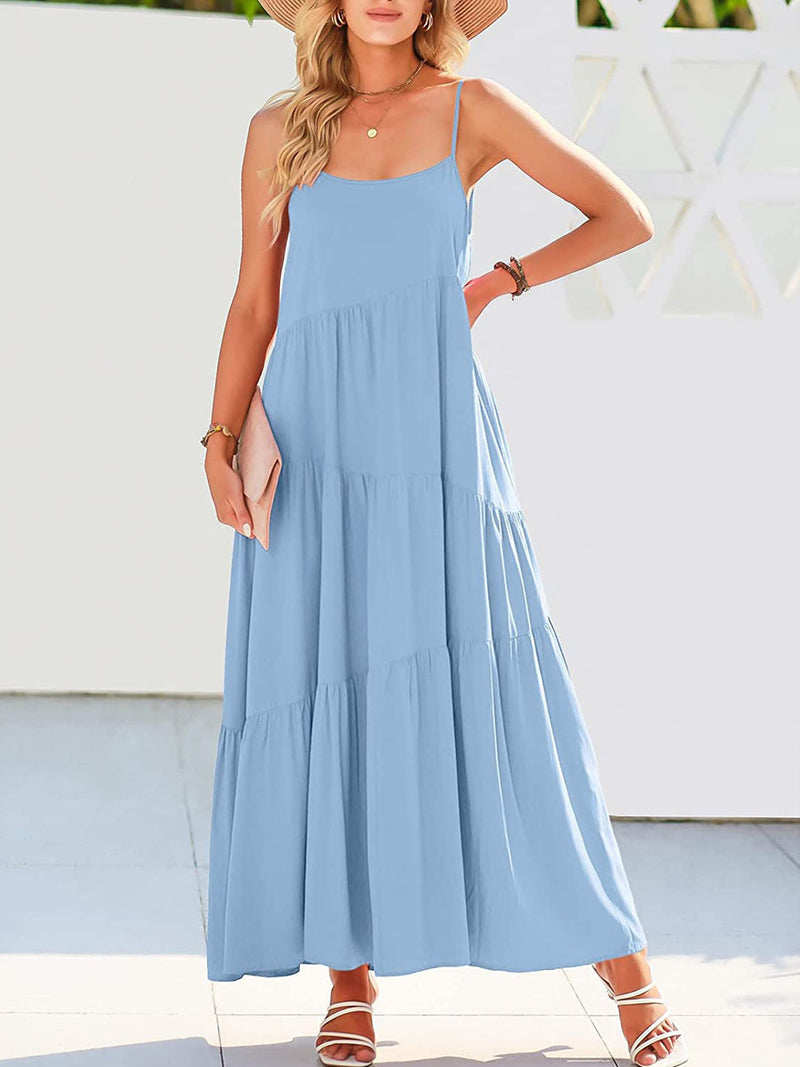 Elegant Full Size Ruched Tiered Spaghetti Strap Dress in blue, featuring moderate stretch and layered design.