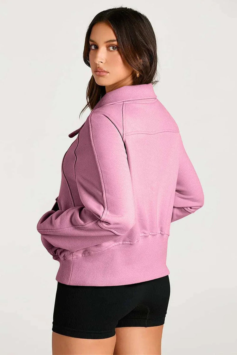 Half Zip Long Sleeve Sweatshirt in pink, stylish and comfortable for cooler weather.