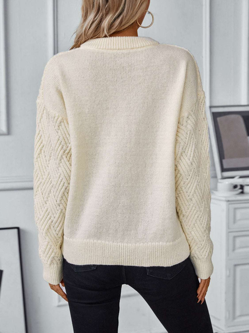 Round Neck Long Sleeve Woven Sweater in cream, showing back view with textured sleeves.