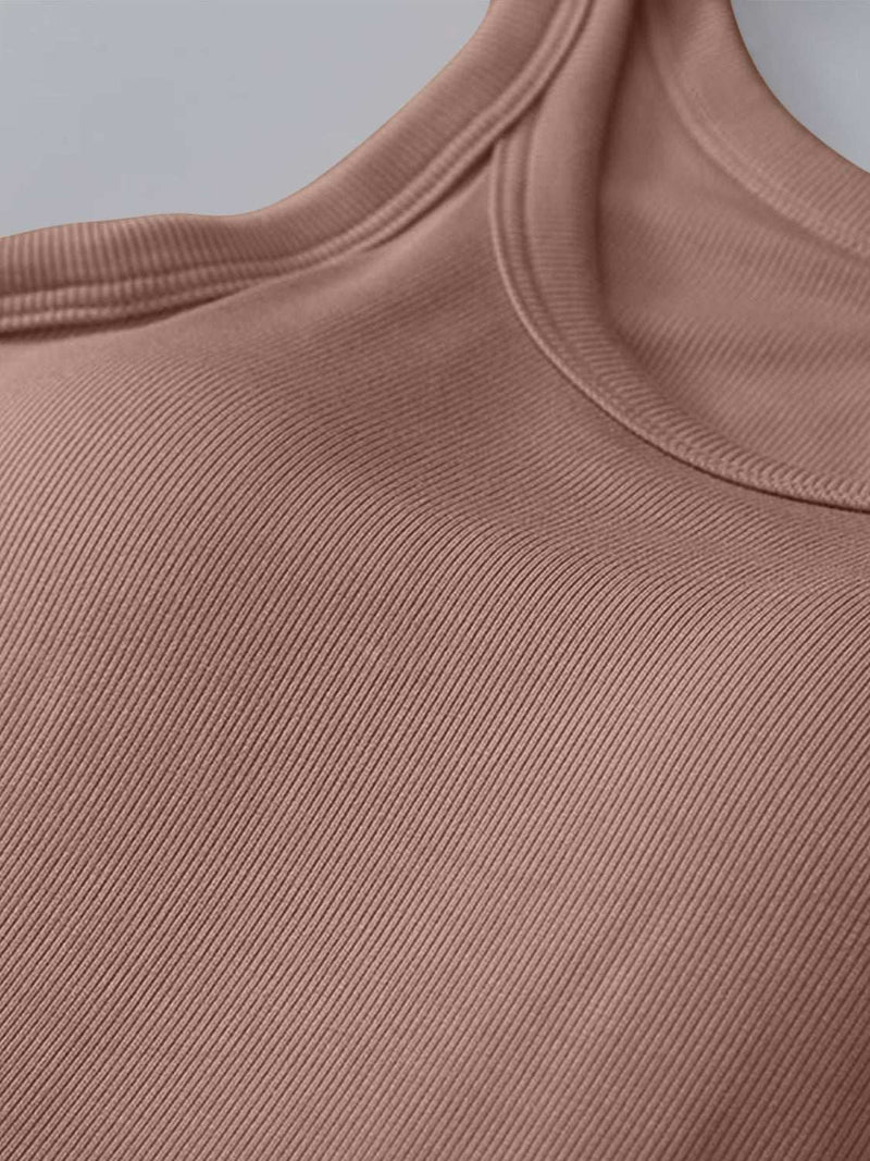 Round neck tank with moderate stretch and basic style in beige color.