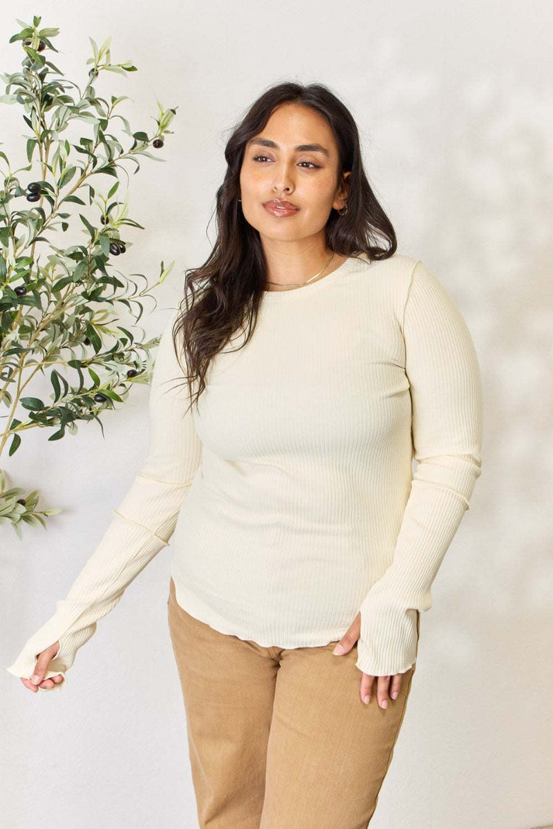 Culture Code full size ribbed round neck long sleeve top in cream worn by model.