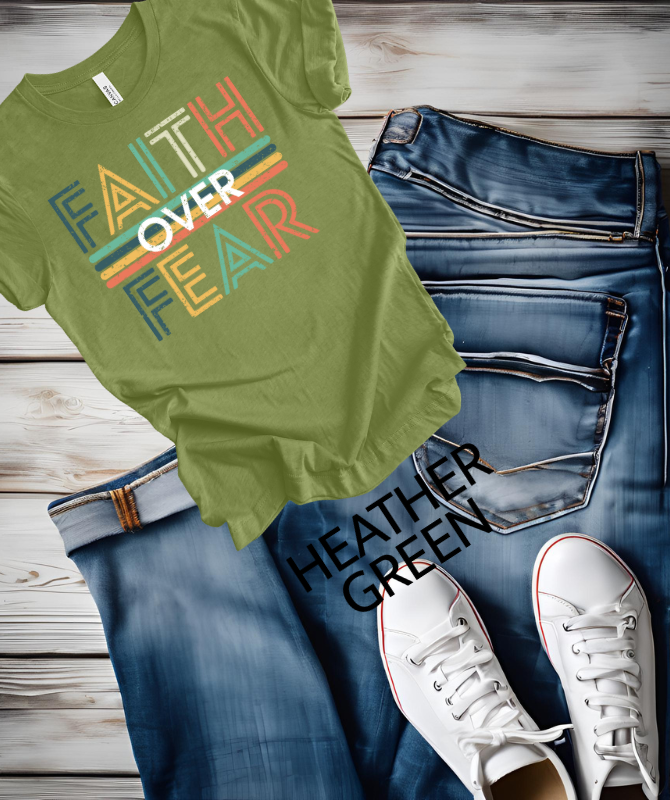 Faith over Fear retro Graphic teeThe Bella canvas unisex T-shirt is made with a comfortable poly cotton blend, perfect for everyday wear. The DTF print adds a unique touch to the classic crew neck dShirts & TopsKlondike Creek Unique BoutiqueKlondike Creek Unique BoutiqueFear retro Graphic tee