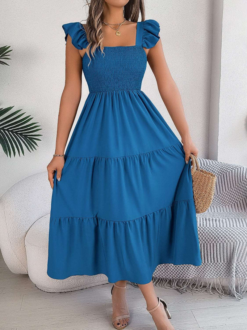 Smocked square neck cap sleeve midi dress in blue.