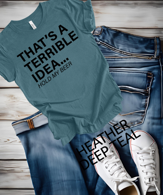 That's a terrible Idea hold my Beer graphic TeeThe Bella canvas unisex T-shirt is made with a comfortable poly cotton blend, perfect for everyday wear. The DTF print adds a unique touch to the classic crew neck dShirts & TopsKlondike Creek Unique BoutiqueKlondike Creek Unique Boutiqueterrible Idea hold