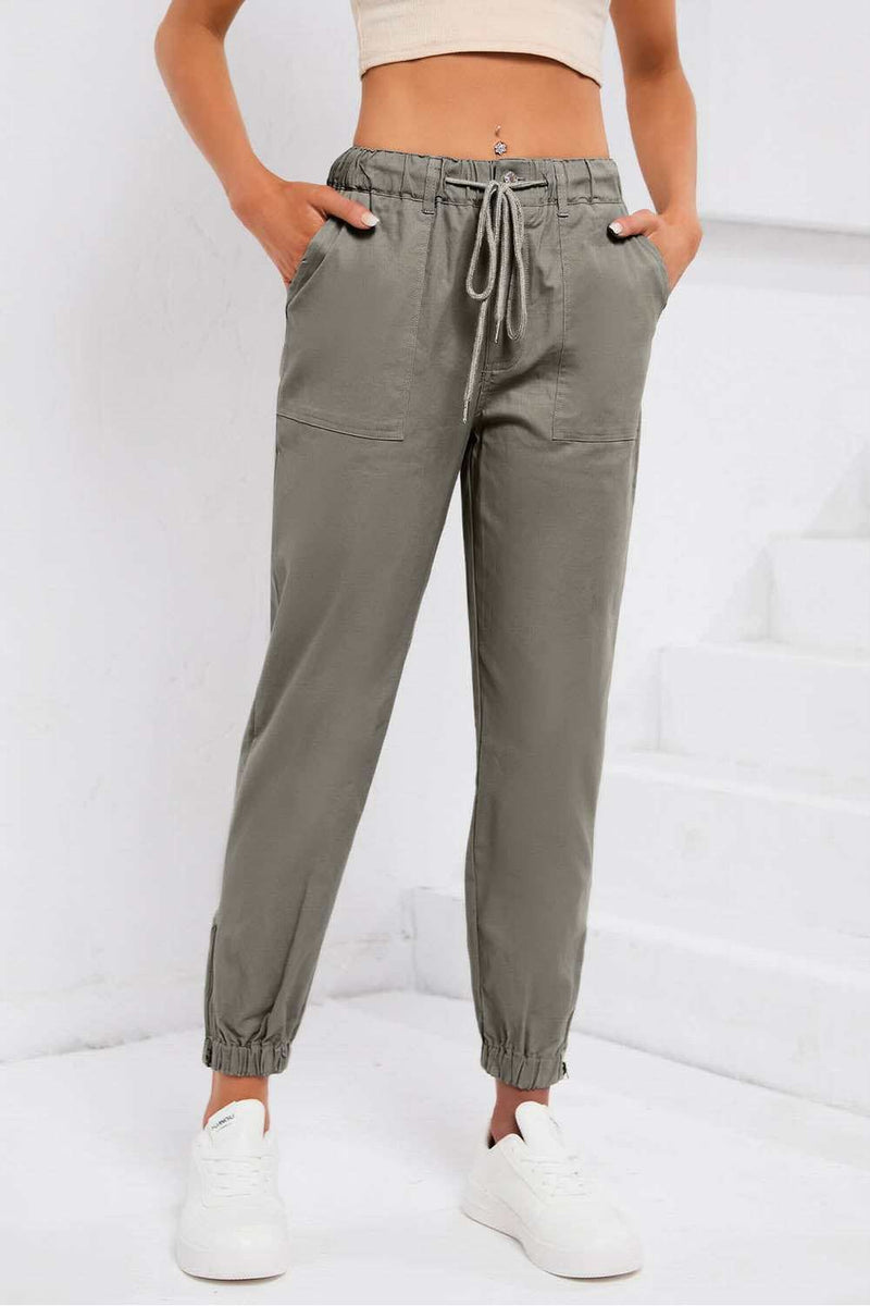 Drawstring Side Zip JoggersFeatures: Pocketed, Drawstring
Sheer: Opaque
Material composition: 95% polyester, 5% elastane
Care instructions: Machine wash cold. Tumble dry low.
Imported
Product BottomsTrendsiKlondike Creek Unique BoutiqueDrawstring Side Zip Joggers