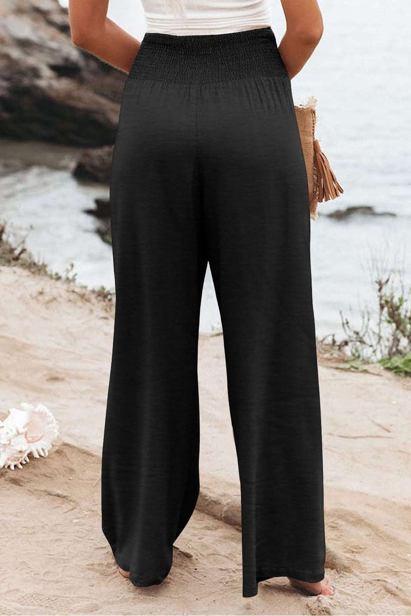 Plus Size Smocked High Waist Wide Leg PantsFeatures: Pocketed
Sheer: Opaque
Material composition: 100% polyester
Care instructions: Machine wash cold. Tumble dry low.
Imported
Product measurements:1X:Waist 35BottomsTrendsiKlondike Creek Unique BoutiqueSize Smocked High Waist Wide Leg Pants